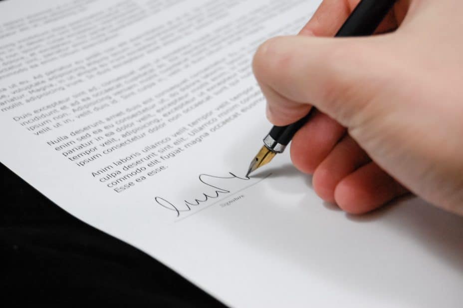 Site migration step 2: check contracts, image of contract and hand signing it